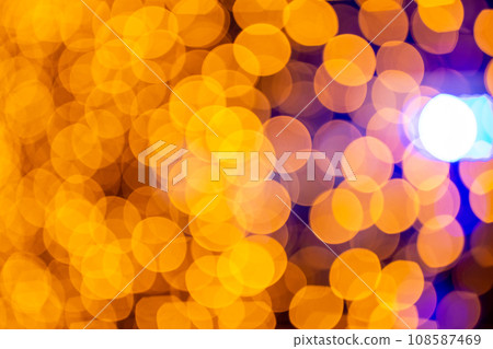Abstract circular bokeh background of Christmaslight. bokeh from garlands. background for screensaver. Defocused lights. Blurred bokeh with yellow color lights. Abstract circular bokeh background of Christmaslight. bokeh from garlands. background for screensaver. Defocused lights. Blurred bokeh with yellow color lights. 108587469