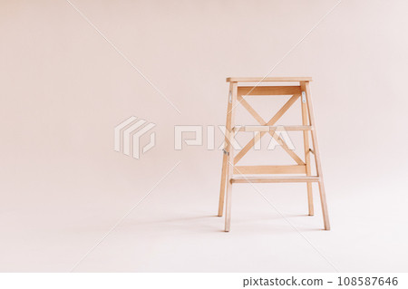 New wooden ladder on the white background. isolated stepladder. Space for text New wooden ladder on the white background. isolated stepladder. Space for text 108587646