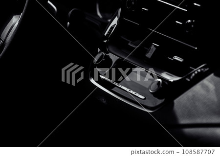 control panel and cd in a new modern car interior control panel and cd in a new modern car interior 108587707