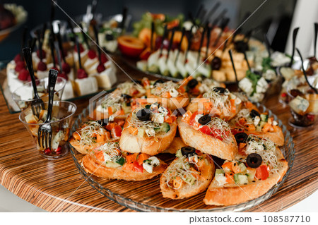 Catering. Food for parties, corporate parties, conferences, forums, banquets. selective focus Catering. Food for parties, corporate parties, conferences, forums, banquets. selective focus 108587710