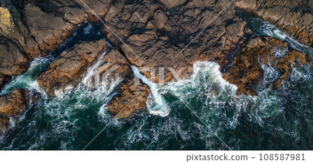 Rocky Shore on the Pacific Ocean Coast. Sunny Sunset. Rocky Shore on the Pacific Ocean Coast. Sunny Sunset. 108587981