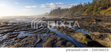 Rocky Shore on the Pacific Ocean Coast. Sunny Sunset. Nature Background Rocky Shore on the Pacific Ocean Coast. Sunny Sunset. Nature Background 108588019