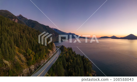 Sea to Sky Highway on West Coast of Pacific Ocean. Aerial Mountain Landscape. Twilight sky. Sea to Sky Highway on West Coast of Pacific Ocean. Aerial Mountain Landscape. Twilight sky. 108588043