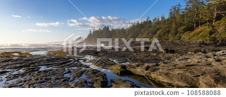 Rocky Shore on the Pacific Ocean Coast. Sunny Sunset. Nature Background Rocky Shore on the Pacific Ocean Coast. Sunny Sunset. Nature Background 108588088