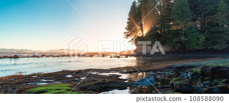 Rocky Shore on the Pacific Ocean Coast. Sunny Sunset. Nature Background 108588090