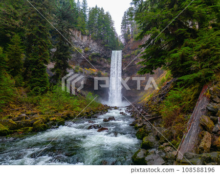 Waterfall, river and green trees in Canadian Nature Landscape. Waterfall, river and green trees in Canadian Nature Landscape. 108588196