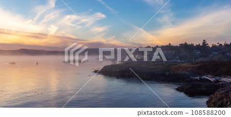 Rocky Shore on the Pacific Ocean Coast. Foggy Sunset. Victoria, Vancouver Island, BC, Canada. 108588200