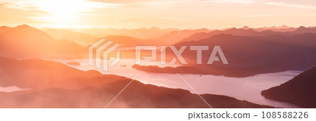 Rocky Shore on the Pacific Ocean Coast in Tofino, Vancouver Island, BC, Canada. Sunset. Aerial 108588226