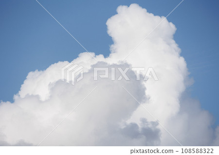 white cumulus clouds in blue sky, beautiful view of the sky and storm clouds. Huge majestic cloud white cumulus clouds in blue sky, beautiful view of the sky and storm clouds. Huge majestic cloud 108588322
