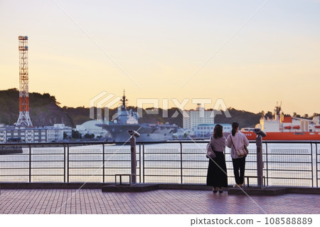 Female customer at Yokosuka Verny Park at dusk 108588889