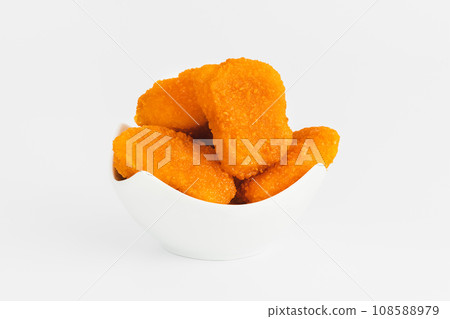 Chicken Breaded Fillet. Breaded chicken nuggets. Fast homemade food at home. Chicken breaded schnitzels. Breaded Chicken Inner Fillet on a White Background,Chicken Breaded Raw Meat. Fast cooking. Chicken Breaded Fillet. Breaded chicken nuggets. Fast homemade food at home. Chicken breaded schnitzels. Breaded Chicken Inner Fillet on a White Background,Chicken Breaded Raw Meat. Fast cooking. 108588979