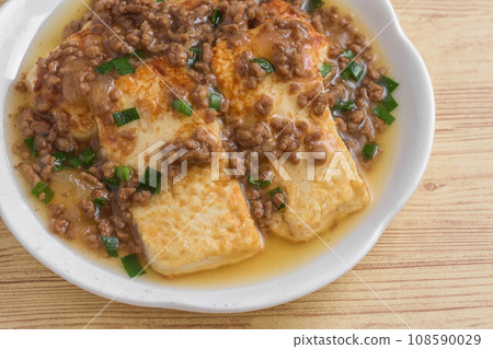Tofu steak with ground meat sauce Tofu steak with ground meat sauce 108590029