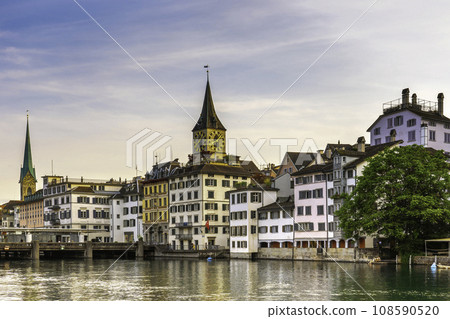 Scenic view of historic Zurich city center with famous Fraumunster and river Limmat at Lake Zurich,Switzerland 108590520
