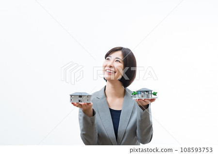 A woman in a suit, a businessman in a suit, an office lady in a suit 108593753