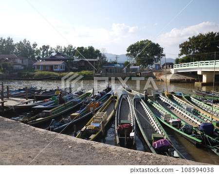 A boat floating on Inle Lake, the largest lake in Myanmar A boat floating on Inle Lake, the largest lake in Myanmar 108594038