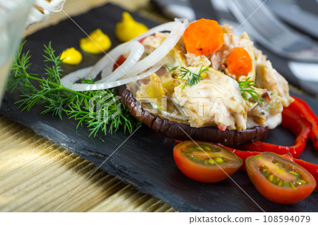 Chicken salad on ring of roasted eggplant Chicken salad on ring of roasted eggplant 108594079