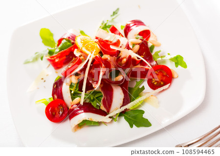 Fresh salad with dried duck breast 108594465