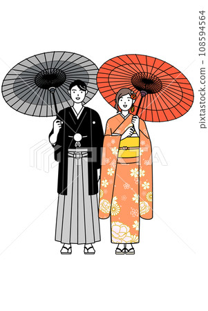 Men and women in kimonos holding Japanese umbrellas during New Year's shrine visits and sightseeing 108594564