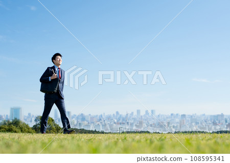 Walking businessman 108595341