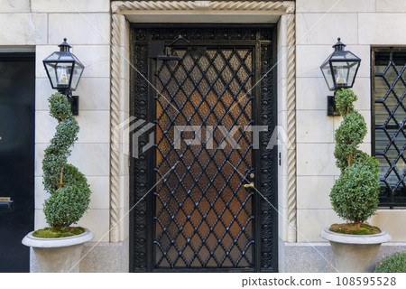 beautiful front door of a house with an aristocratic family in the center of Manhattan 108595528