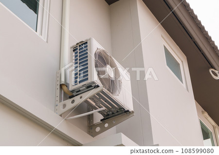 Air condition outdoor unit compressor install outside the house 108599080