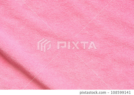 Pink towel fabric texture surface close up background Pink towel fabric texture surface close up background 108599141