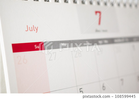 July calendar page with months and dates business planning appointment meeting concept July calendar page with months and dates business planning appointment meeting concept 108599445
