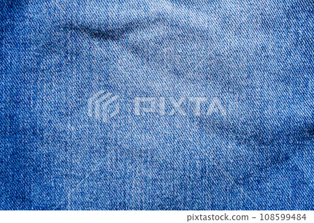 Denim blue jeans texture close up background top view 108599484