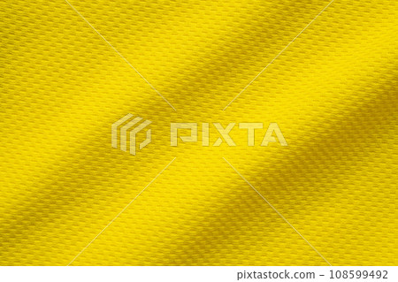 Yellow sports clothing fabric football shirt jersey texture close up Yellow sports clothing fabric football shirt jersey texture close up 108599492