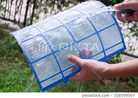 cleaning air conditioner dirty filter 108599507