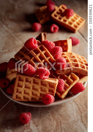 Belgian waffles with raspberries. Belgian waffles with raspberries. 108599621
