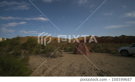A bright starry night in the colored mountains. 108599687