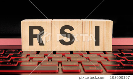 RSI Relative Strength Index written on wooden cubes on the laptop keyboard RSI Relative Strength Index written on wooden cubes on the laptop keyboard 108600397
