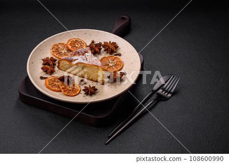 A piece of baked homemade pie with apple or pear, with cinnamon A piece of baked homemade pie with apple or pear, with cinnamon 108600990