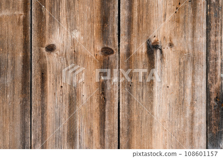 The background of the wall with the texture of boards painted with brown paint The background of the wall with the texture of boards painted with brown paint 108601157
