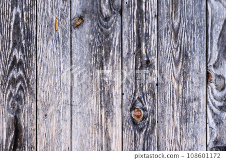 The background of the wall with the texture of boards painted with gray paint The background of the wall with the texture of boards painted with gray paint 108601172