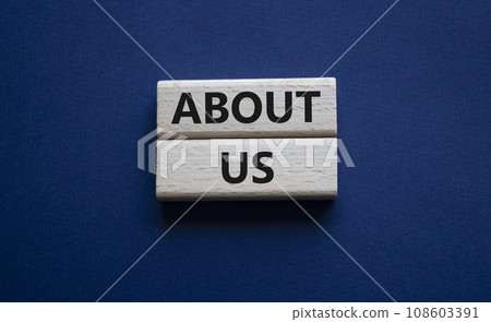 About us symbol. Wooden blocks with words About us. Beautiful deep blue background. Business and About us concept. Copy space. About us symbol. Wooden blocks with words About us. Beautiful deep blue background. Business and About us concept. Copy space. 108603391