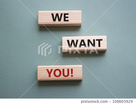 We want You symbol. Wooden blocks with words We want you. Beautiful grey green background. Business and We want You concept. Copy space 108603929