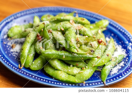 Black edamame with garlic and cheese Black edamame with garlic and cheese 108604115