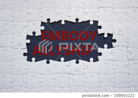 Embody Allyship symbol. Concept word Embody Allyship on white puzzle. Beautiful dark blue background. Business and Embody Allyship concept. Copy space Embody Allyship symbol. Concept word Embody Allyship on white puzzle. Beautiful dark blue background. Business and Embody Allyship concept. Copy space 108605222