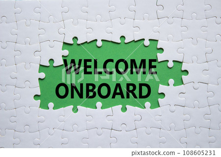 Welcome onboard symbol. Concept words Welcome onboard on white puzzle. Beautiful green background. Business and Welcome onboard concept. Copy space. Welcome onboard symbol. Concept words Welcome onboard on white puzzle. Beautiful green background. Business and Welcome onboard concept. Copy space. 108605231