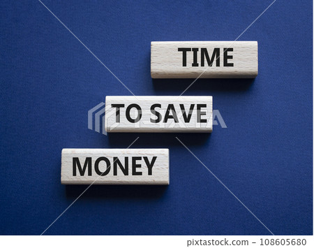 Time to save money symbol. Wooden blocks with words Time to save money. Beautiful deep blue background. Business and Time to save money concept. Copy space. 108605680
