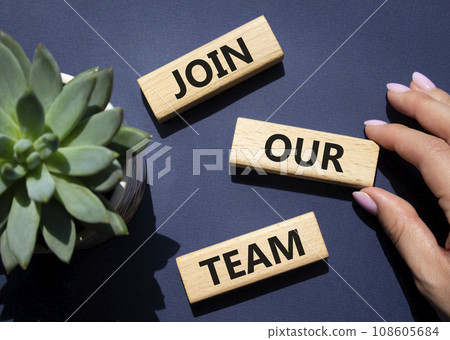 Join our team symbol. Wooden blocks with words Join our team. Beautiful deep blue background with succulent plant. Businessman hand. Business and Join our team concept. Copy space. 108605684