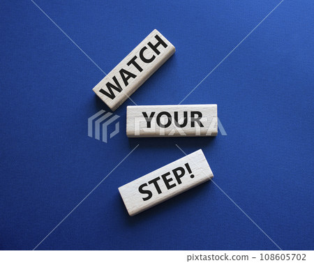 Watch your Step symbol. Concept words Watch your Step on wooden blocks. Beautiful deep blue background. Business and Watch your Step concept. Copy space. Watch your Step symbol. Concept words Watch your Step on wooden blocks. Beautiful deep blue background. Business and Watch your Step concept. Copy space. 108605702