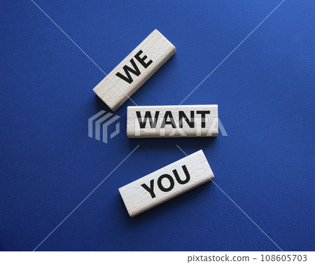 We want you symbol. Concept words We want you on wooden blocks. Beautiful deep blue background. Business and We want you concept. Copy space. 108605703
