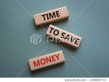 Time to save money symbol. Wooden blocks with words Time to save money. Beautiful grey green background. Business and Time to save money concept. Copy space. Time to save money symbol. Wooden blocks with words Time to save money. Beautiful grey green background. Business and Time to save money concept. Copy space. 108605714