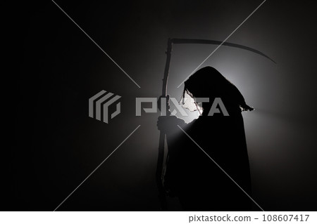 silhouette of death with a scythe. Dark reaper on a black background. Death Grim Reaper Costume for silhouette of death with a scythe. Dark reaper on a black background. Death Grim Reaper Costume for 108607417