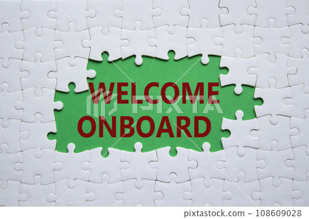 Welcome onboard symbol. Concept words Welcome onboard on white puzzle. Beautiful green background. Business and Welcome onboard concept. Copy space. Welcome onboard symbol. Concept words Welcome onboard on white puzzle. Beautiful green background. Business and Welcome onboard concept. Copy space. 108609028