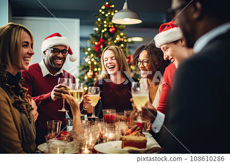 a group of people having a christmas party at the same time, all smiling and drinking champagne in their glasses a group of people having a christmas party at the same time, all smiling and drinking champagne in their glasses 108610286
