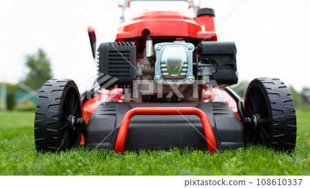 powerful self-propelled lawn mower, engine in garden powerful self-propelled lawn mower, engine in garden 108610337